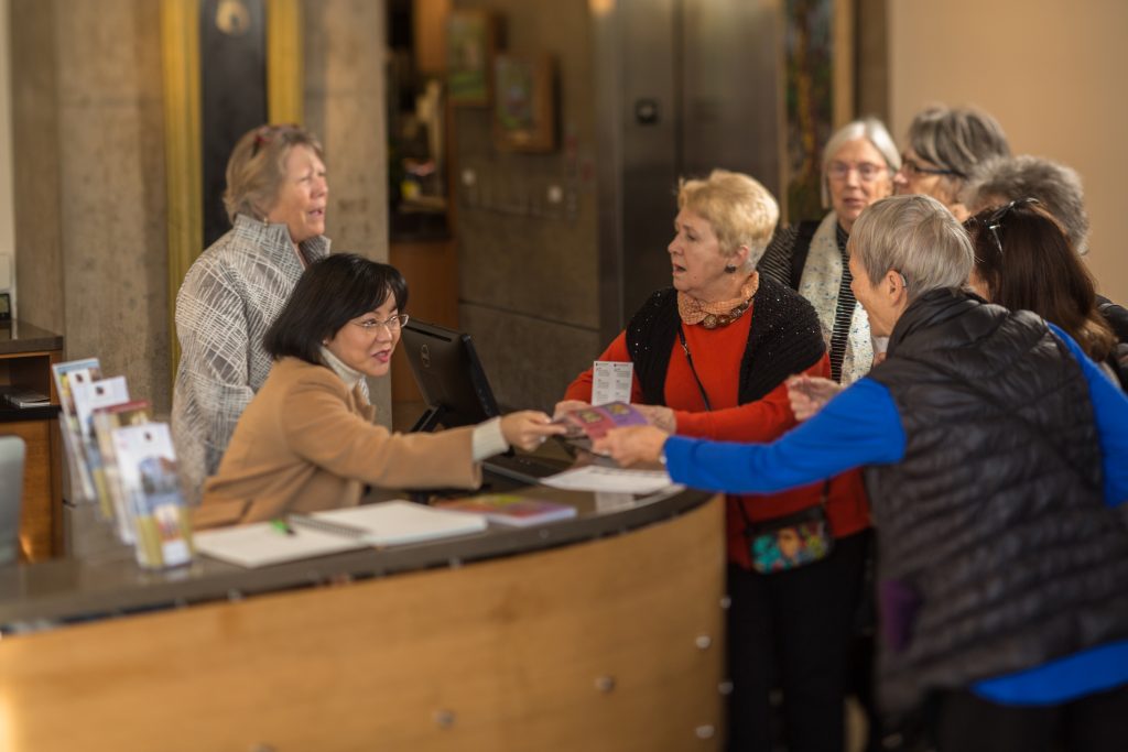 Docents greeting guests at BIMA.