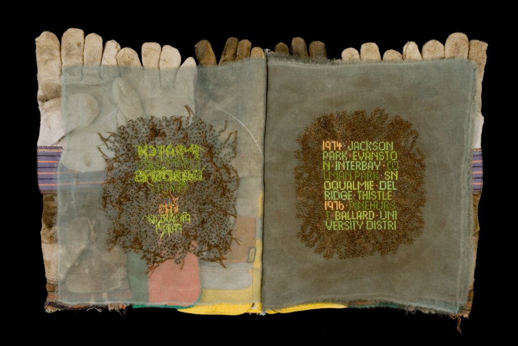 Lou Cabeen, Tend & Befriend, 2014, embroidered names and opening dates of Seattle’s P-Patches on dirt stained silk organza pages, and used work gloves as book cover, one-of-a-kind. Private Collection.