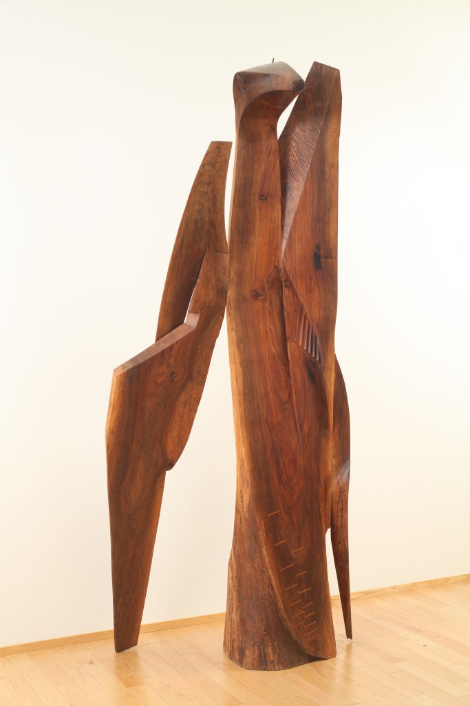 Alan Newberg, God of Black Holes (Up Looks Down), 2015, black walnut, 114"h x 40"w x 40"d, Bainbridge Island Museum of Art Permanent Art Collection, Gift of the Artist, Photo Credit: Richard Nicol