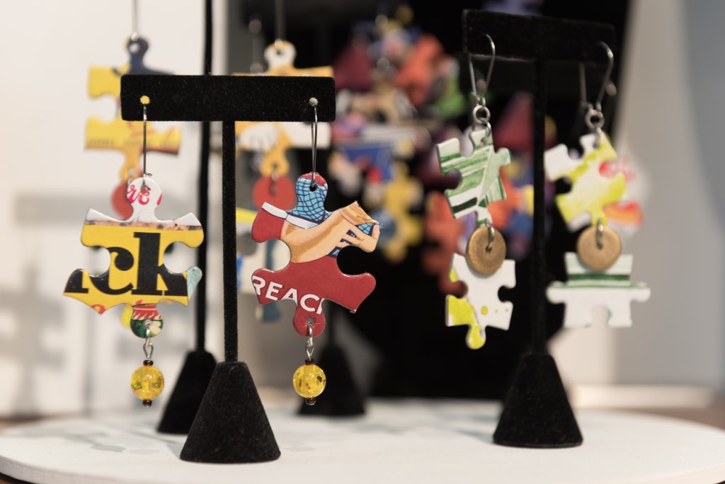 Earrings made from puzzle pieces and stone by Brenda Goldstein-Young