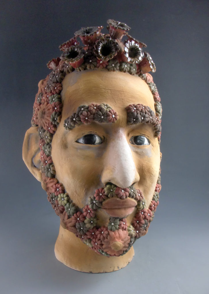 Self portrait sculpture by George Rodriguez.