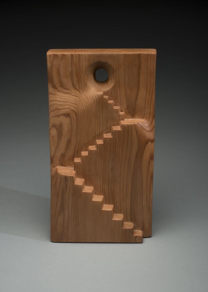 Marceil DeLacy, Ascension, red cedar, 18"h x 9.5"w x 4.25"d. Courtesy of the Artist.