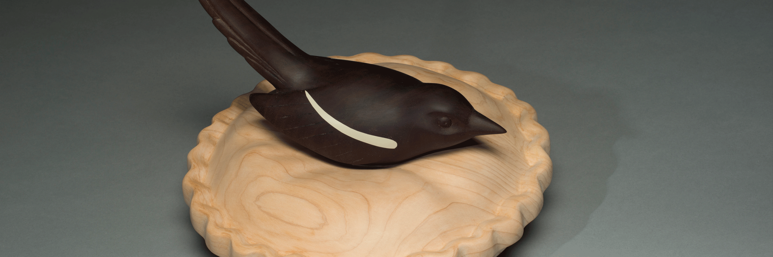 Magpie, Soft Landing Port Orford cedar and black walnut, 11" diameter, 8"h Courtesy of the Artist