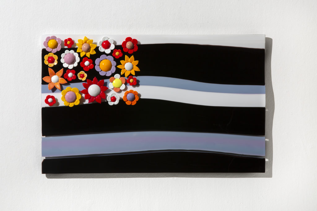 Nancy Callan & Katherine Grey, Floral Glory, 2019, blown and sculpted glass, 15”h x 24.25”w x 2”d, Courtesy of the Artists