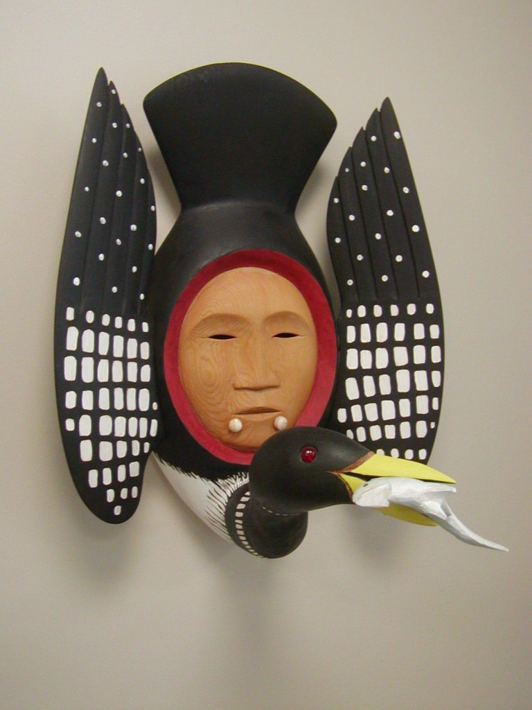Larry ‘Ulaaq’ Ahvakana, Inupiat (Alaska), Male Loon Inua/Spirit Fishing Mask Form, 1999, Orford yellow cedar, acrylic and ivory, 16.5"h x 13.5"w x 11.5"d, Collection of Cynthia Sears, Promised Gift to BIMA