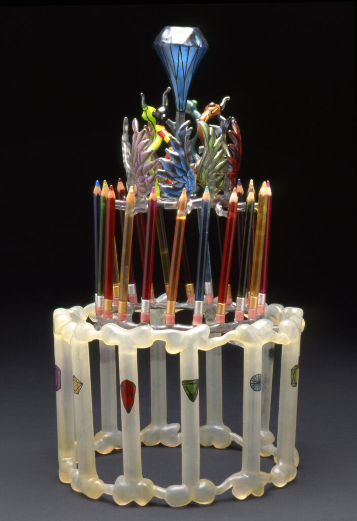 Ginny Ruffner (Seattle), Power of Words to Invent Beauty, 1990, lampworked glass and mixed media, 28”h x 18”w x 18”d. Collection of Tom Mansfield. Photo by Mike Seidl.