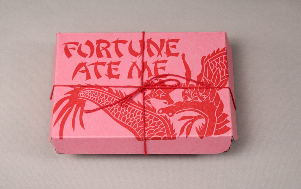 Katherine Ng (Los Angeles, CA), Fortune Ate Me (detail), 1992, letterpress, collagraph, linocut on paper, 5"h x 7"w x 1.5"d; numbered edition. Cynthia Sears Artist's Books Collection.
