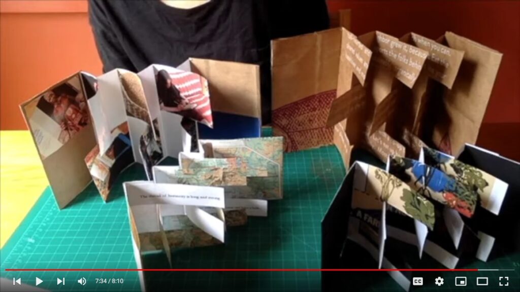 Four flag books on a table