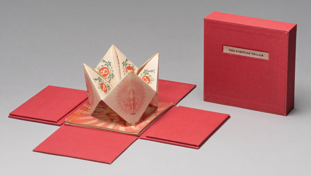 Malini Gupta (Portland, OR), The Fortune Teller, 2015, digital print on waxed paper origami-folded fortune teller, Japanese stab bound book, cloth wrapped box, box: 4.125”h x 5.875”w x 5.875”d; fortune teller: 5.375”h x 5.375”w (flat), 3.75”h x 4.75”w x 4.75”d (open), book: .25”h x 5.25”w x 5.25”d, edition #1 of 10 (first print), Cynthia Sears Artist's Books Collection, photo by Hunter Stroud
