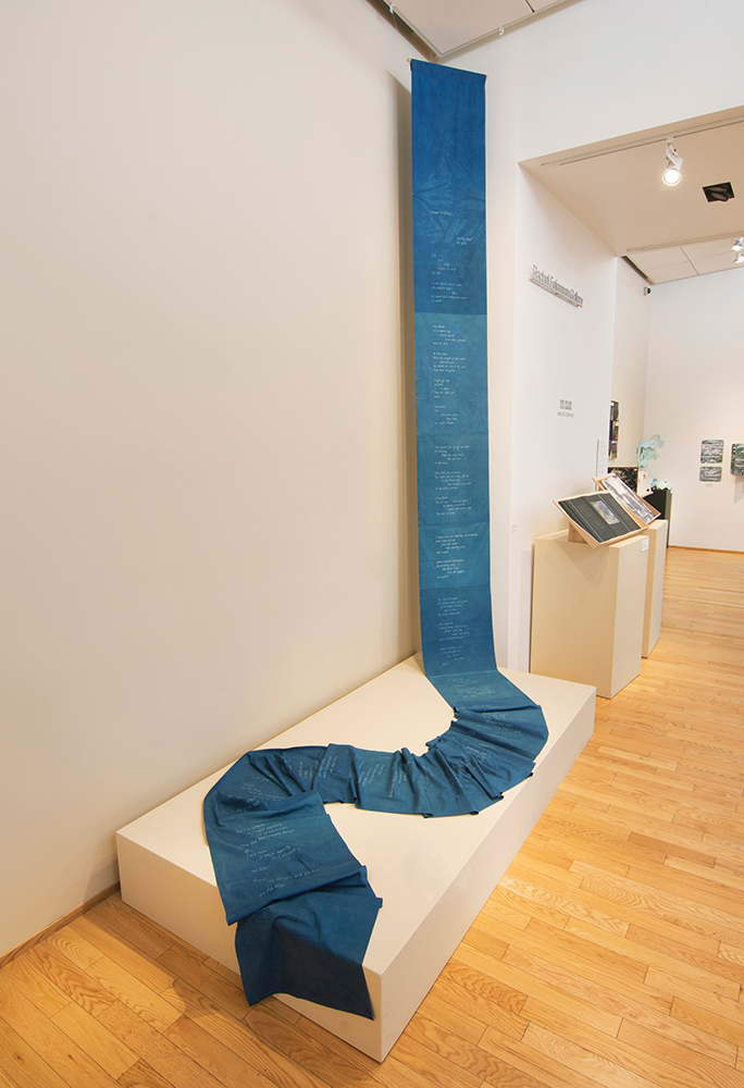 Katherine Kuehn (Portland, OR) and Lorine Niedecker (1903-1970), Paean to Place, 2000, handsewn and indigo-dyed cotton scroll, 19”w x 32’l, unique, Cynthia Sears Artist's Books Collection, photo by Ann Welch