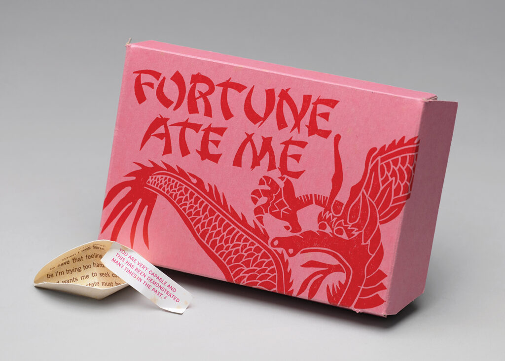 Katherine Ng (Los Angeles, CA), Fortune Ate Me, 1992, letterpress, collograph, linocut on paper, box: 5”h x 7.125”w x 1.5”d; ‘cookie’: 1.5”h x 3”w; fortune: .875”h x 2.375”w, edition of 100, Cynthia Sears Artist's Books Collection