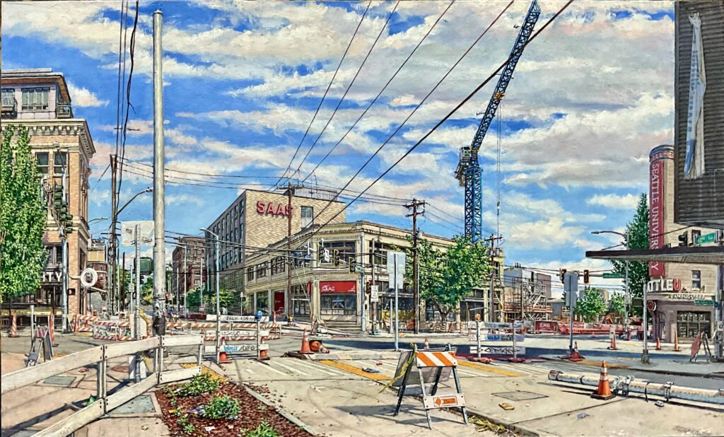 Realistic street scene of 12th and Broadway in Seattle featuring construction barriers, traffic cones, and overhead wires under a blue sky with scattered clouds.